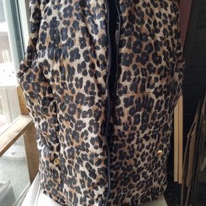 Animal print quilted vest.